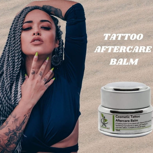 beautiful womean with tattoo on her arms and hands and a jar of cosmetic tattoo aftercare balm on the right
