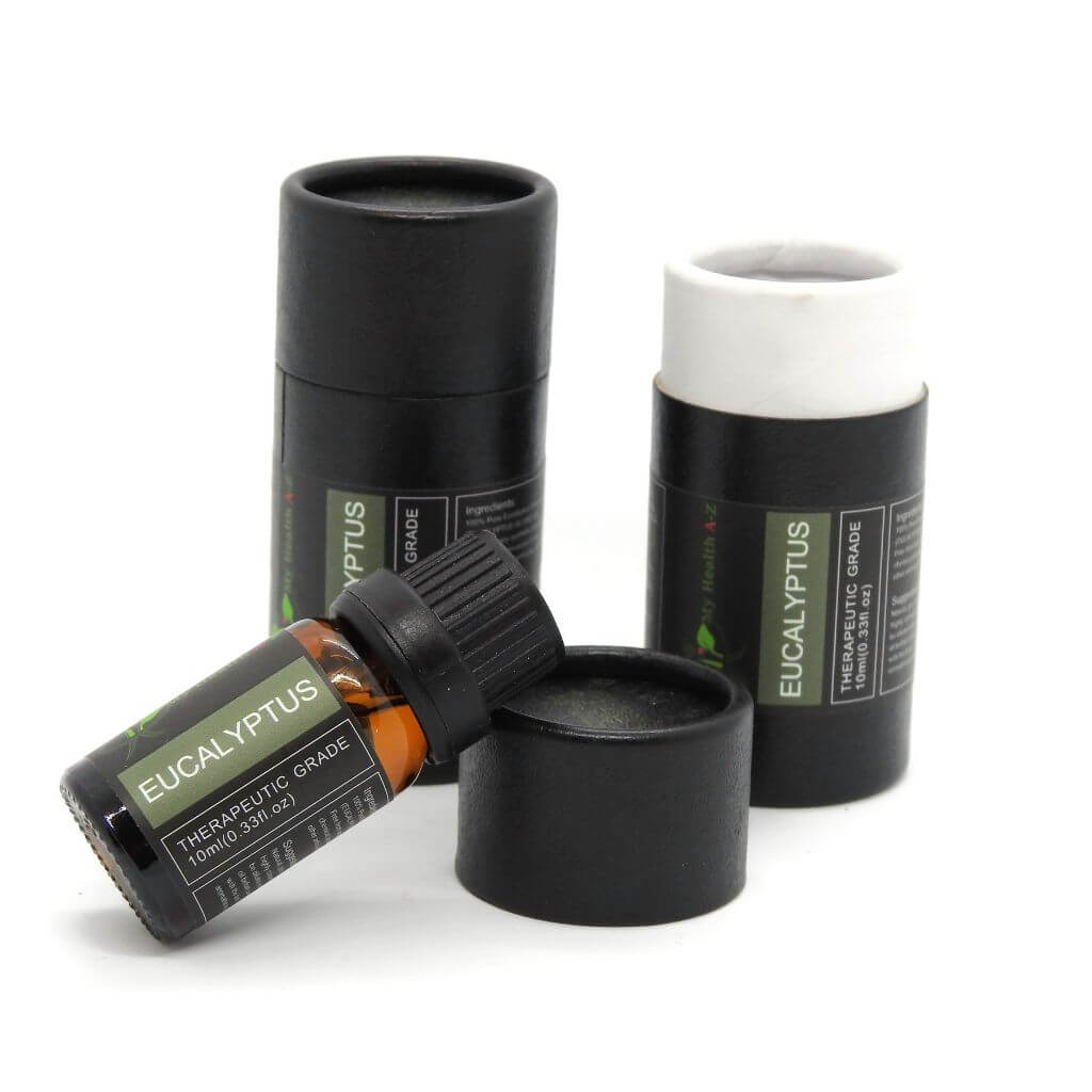 on the left black cylinder on the right open cylinder with bottle resting on the lid