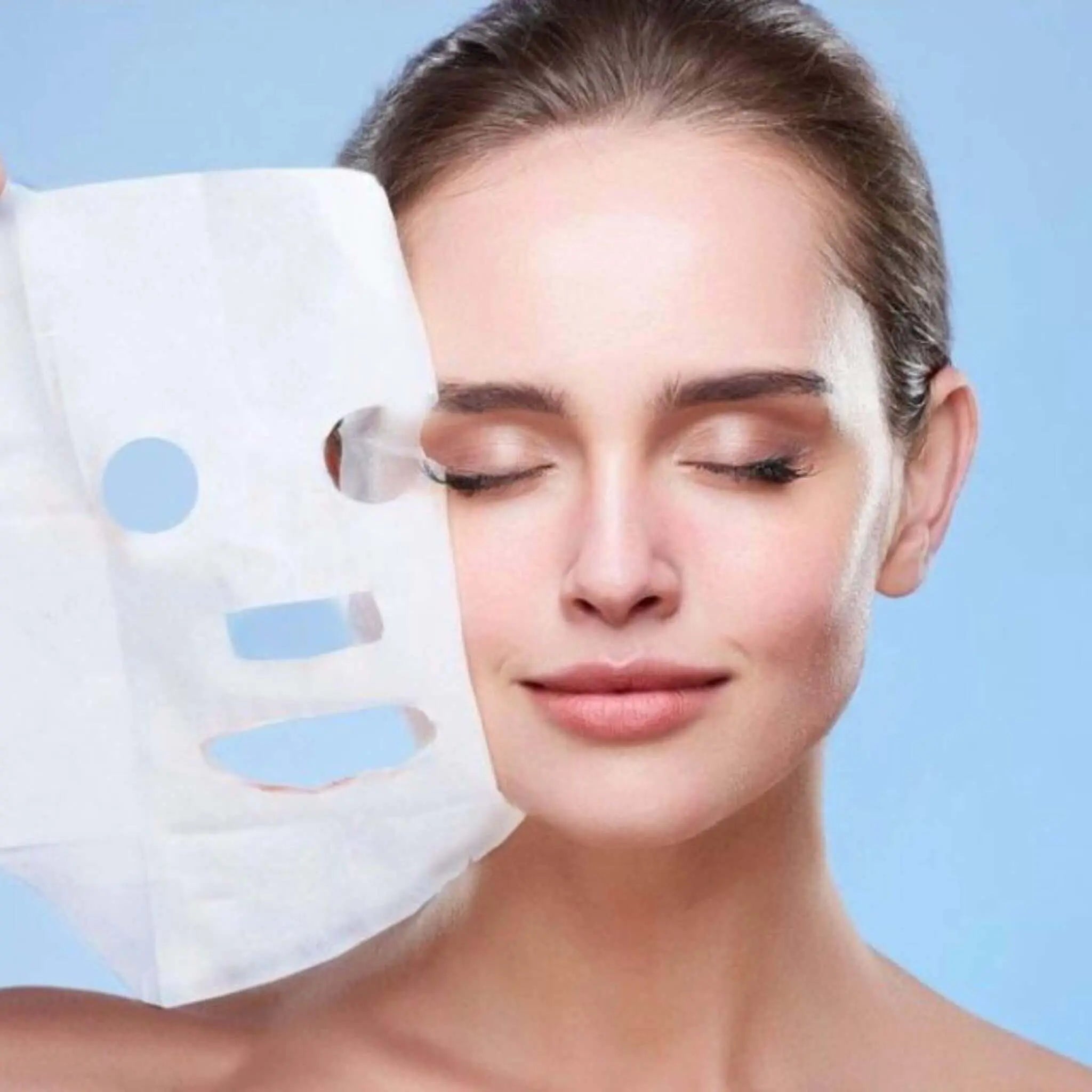 Woman applying My Health A-Z botanical exfoliating sheet mask – gentle exfoliating face mask for smooth skin