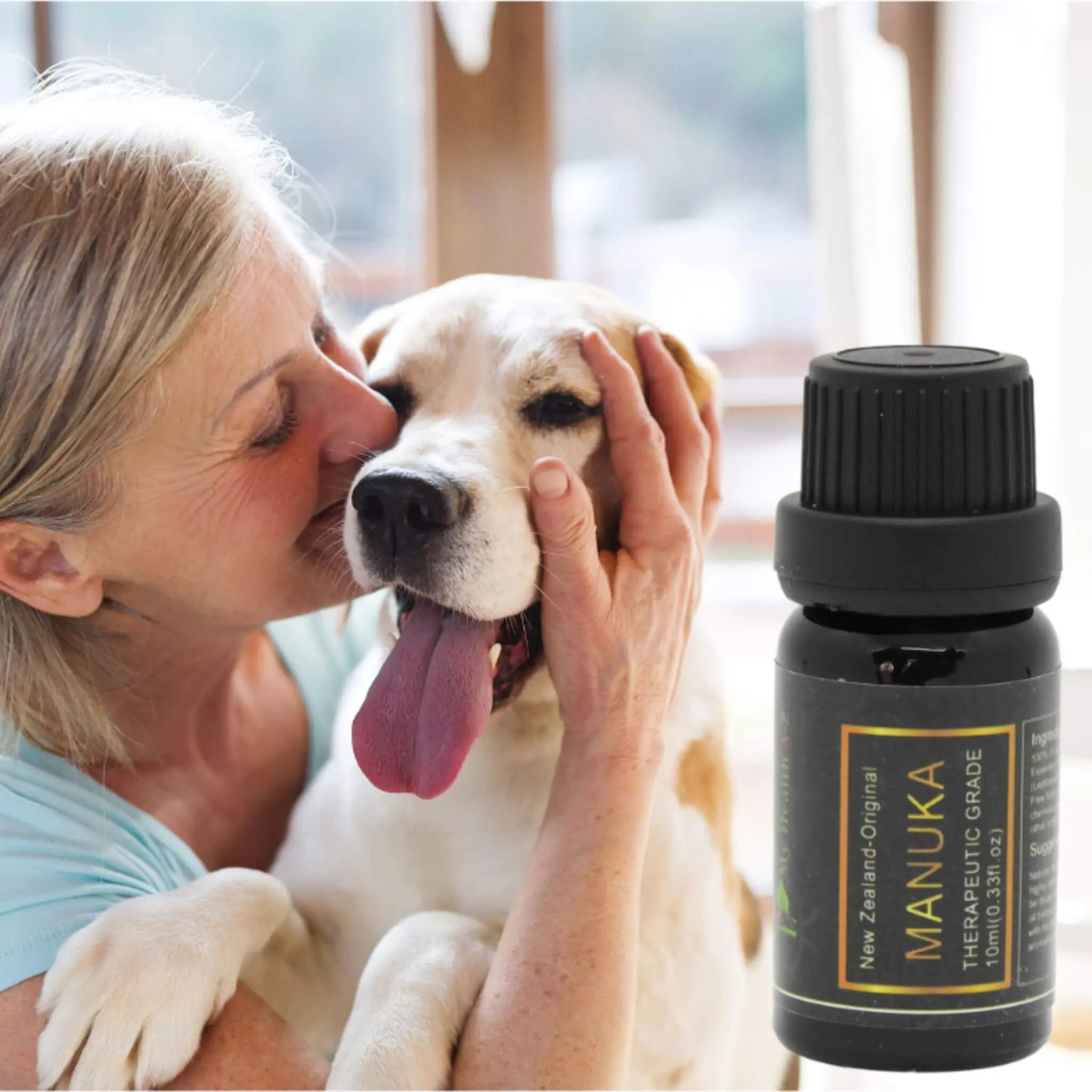 Woman and dog with My Health A-Z Manuka Essential Oil – natural antibacterial oil for home and pets
