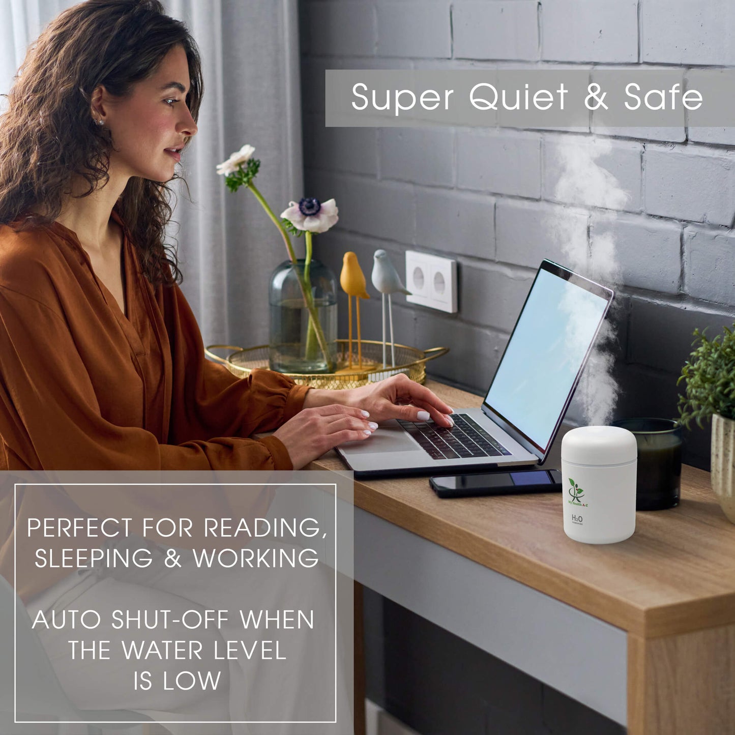 My Health A-Z woman working on a laptop with diffuser next to her