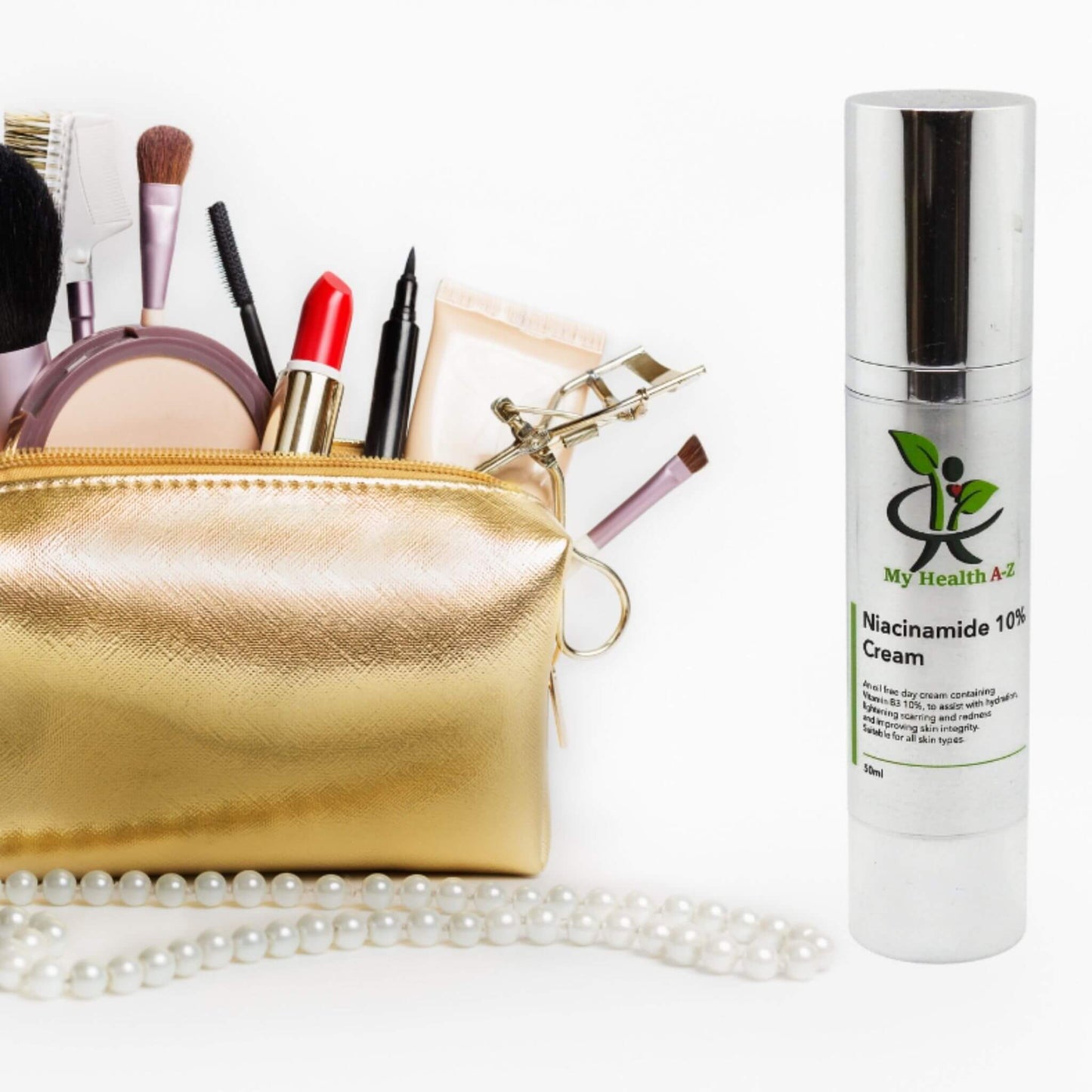 Gold makeup bag with cosmetic items and a bottle of 'My Health A-Z' niacinamde cream on a white background