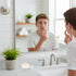 Teen applying acne spot cream to face – targeted acne treatment for teenagers Australia