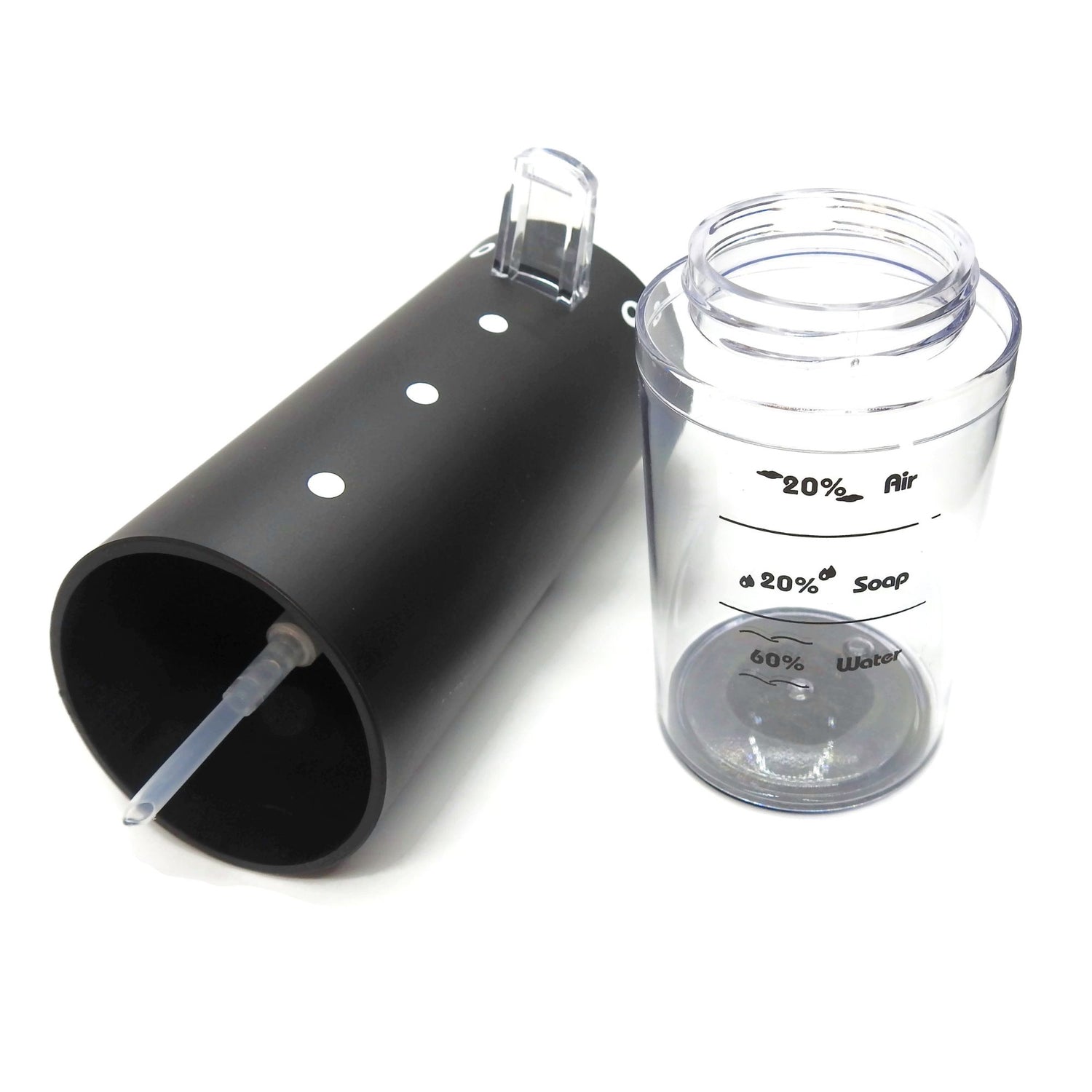 black foam dispenser open to see inside and next to it bottom part measuring container