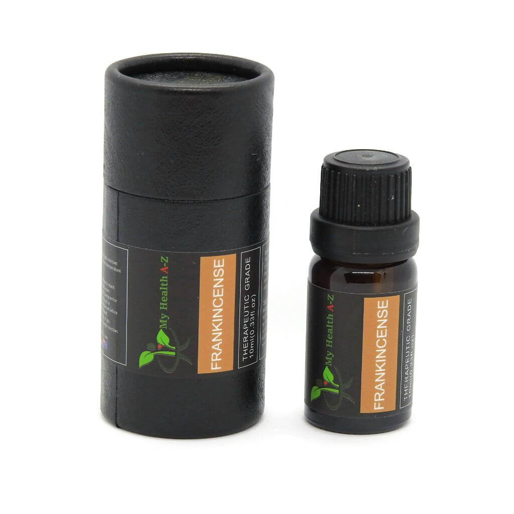'My Health A-Z' Frankincense essential oil bottle and black cylindrical container on a white background