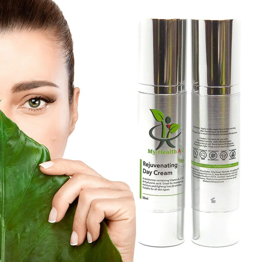 Woman holding a leaf next to two bottles of 'My Health A-Z' Rejuvenating Day Cream on a white background