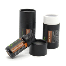 Load image into Gallery viewer, 10ml sandalwood essential oil bottle next to two cylinder has an open lip
