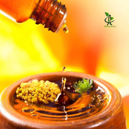 Bottle pouring liquid into a container with a blurred background and 'My Health AZ' logo.