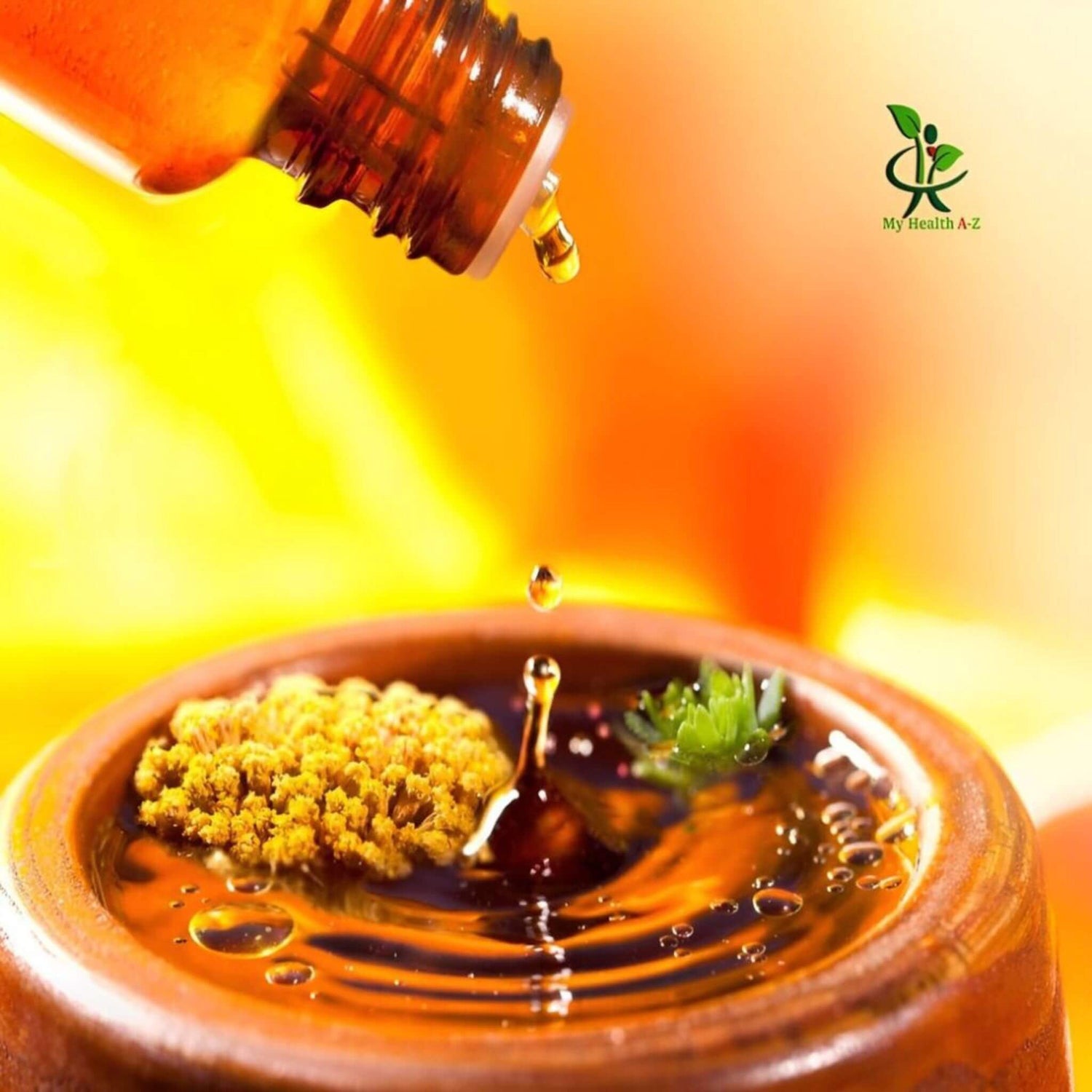 Bottle of oil being poured onto a dish with a blurred background and &